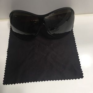 Authentic Gucci Sunglasses with case.